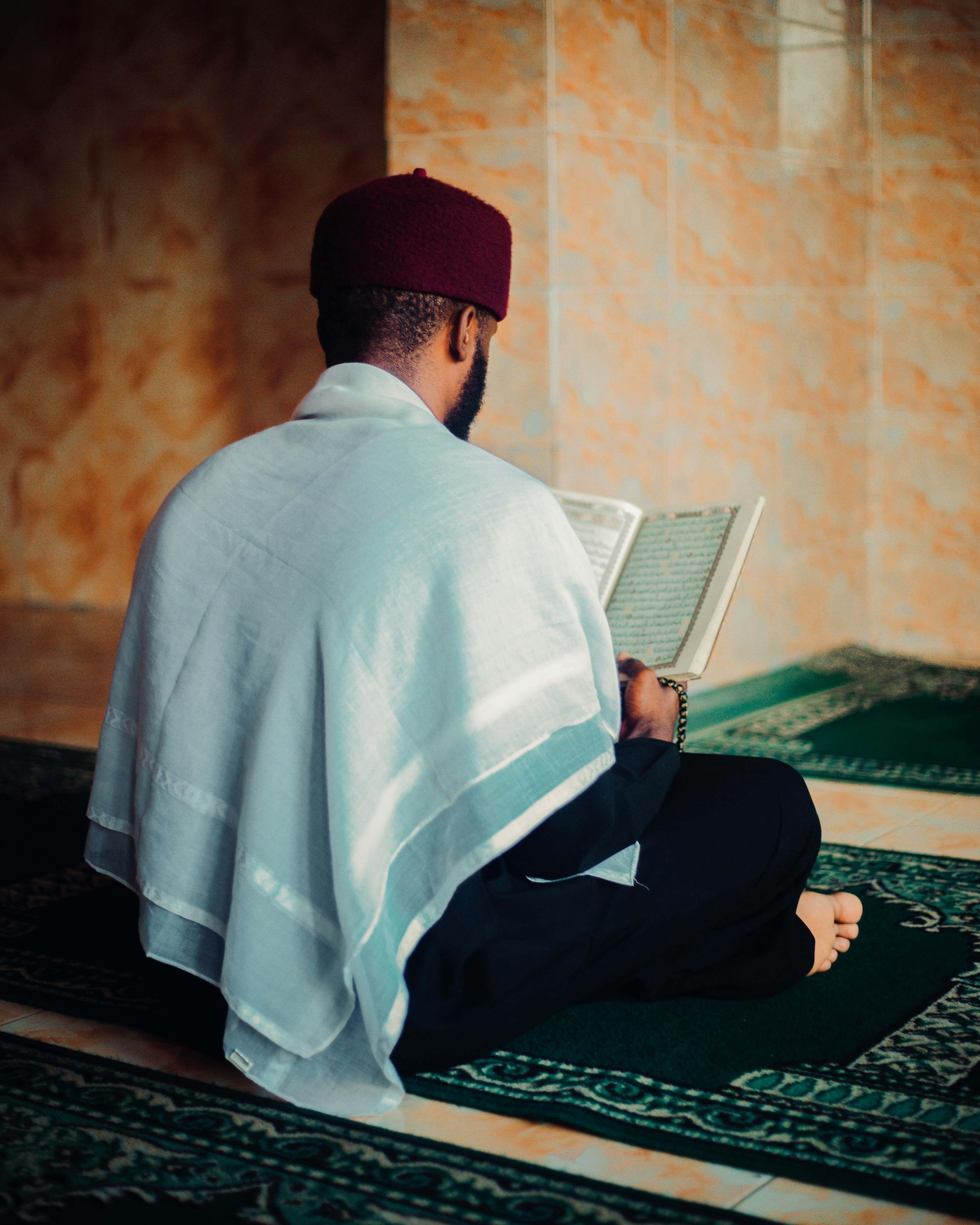 Man praying in a mosque