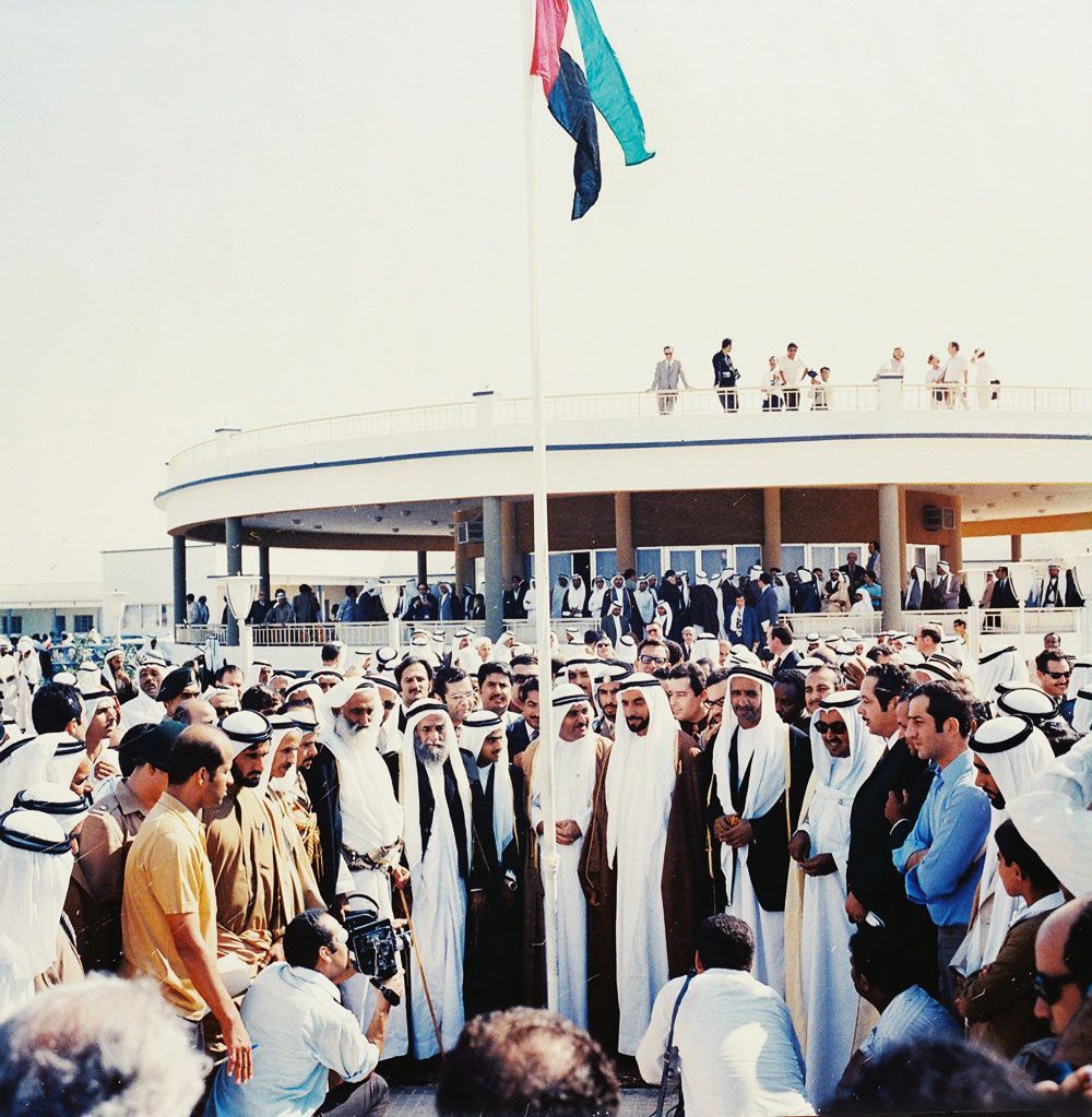 The first raising of the United Arab Emirates flag by the rulers of the emirates at Union House in Dubai on 2 December 1971